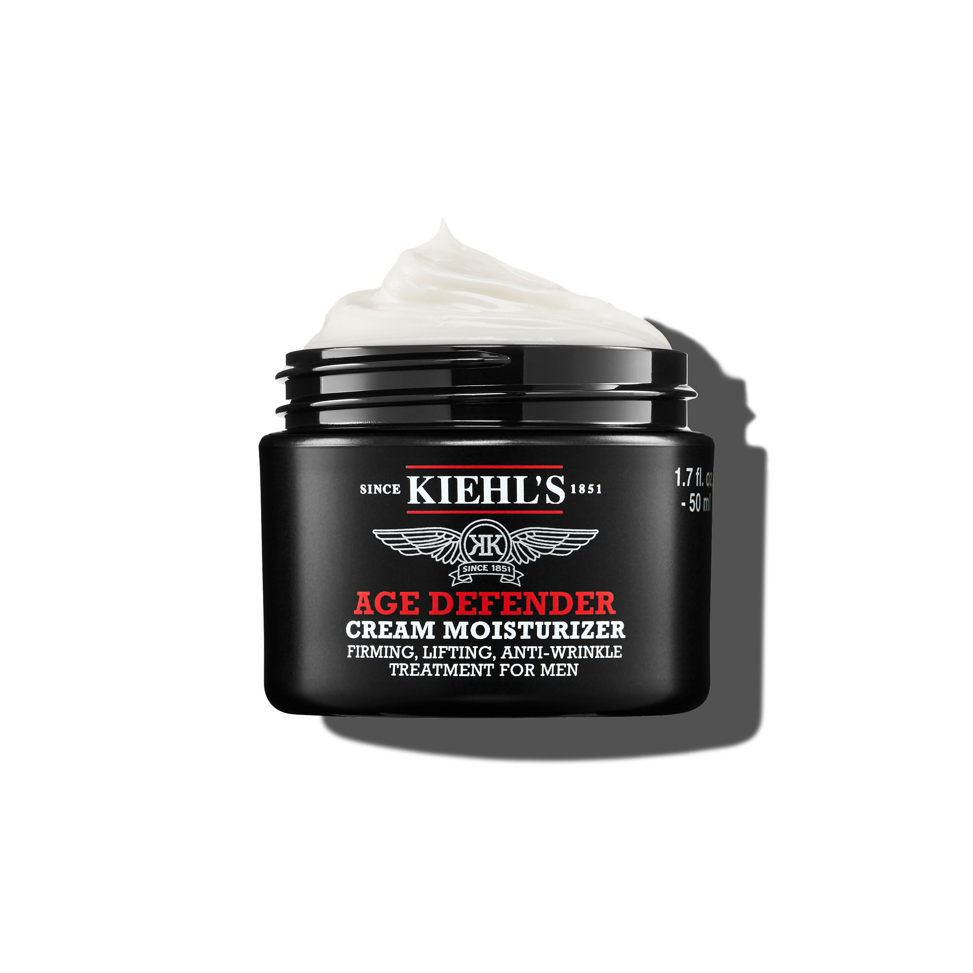 50 мл буркан Kiehl's Age Defender Cream Moisturizer с въздушна текстура на бял фон.