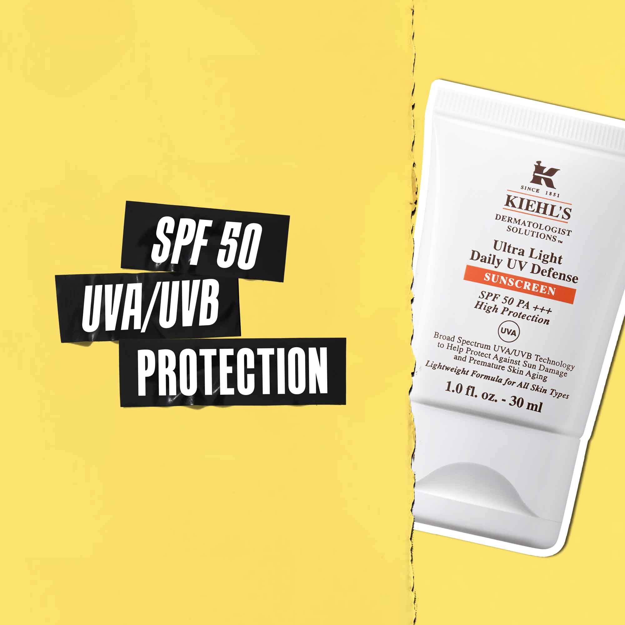 Надпис SPF 50 UVA/UVB защита върху черна лента със снимка на тубата Ultra-Light Daily UV Defense до нея.