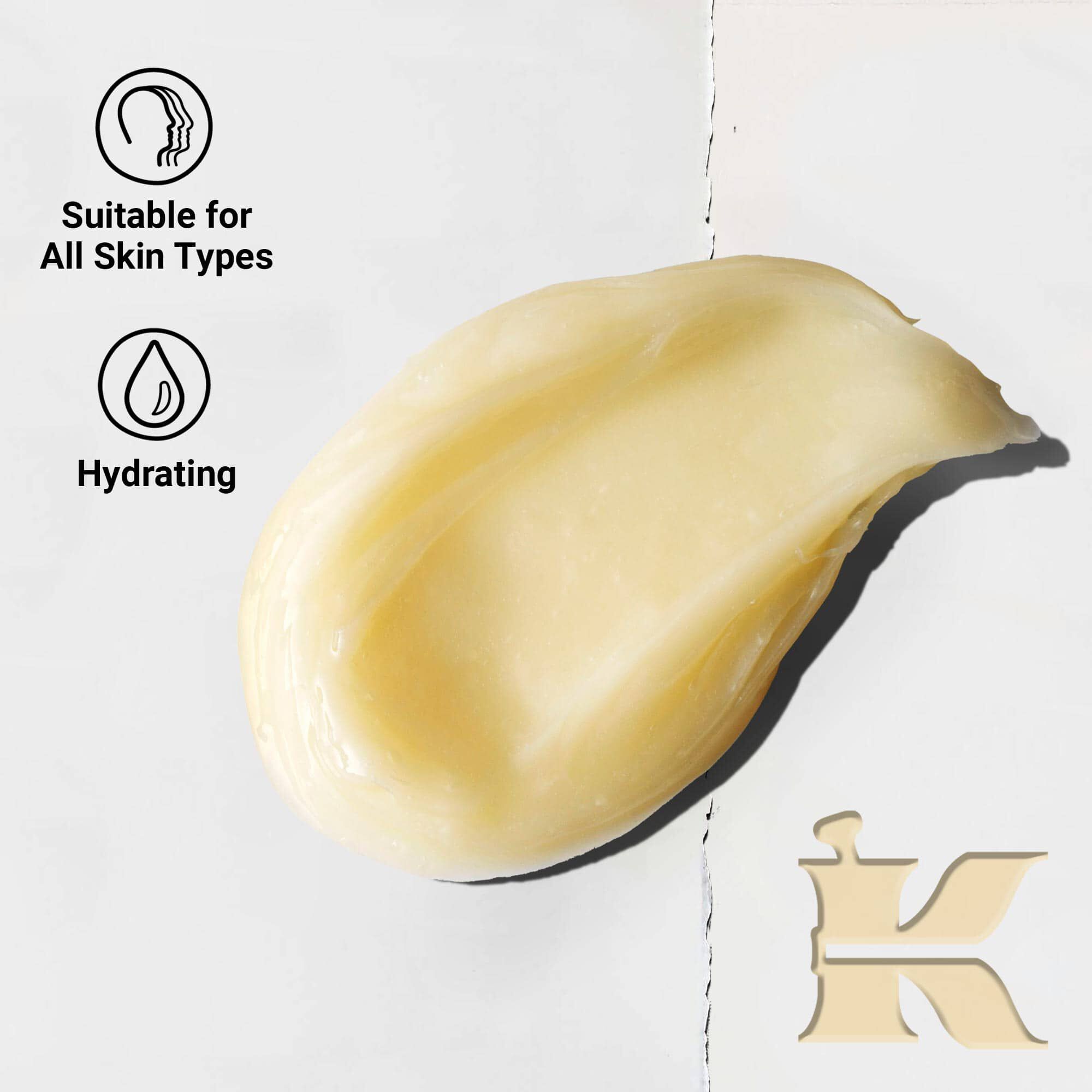 A graphic featuring a large, textured blob of light-yellow cream in the center. On the left, there are two circular icons with text: "Suitable for All Skin Types" and "Hydrating." A beige "K" logo is in the bottom right corner. 