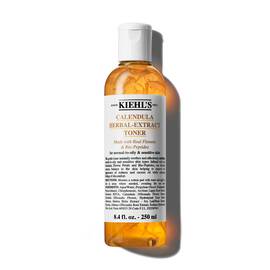 Бутилка от 250 мл Kiehl's Calendula Herbal-Extract Toner с бистра течност и златист оттенък.