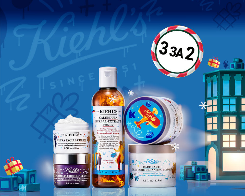 Изображение на козметични продукти на Kiehl's, включващи крем, тонер и маска, с празничен фон и декоративни елементи.