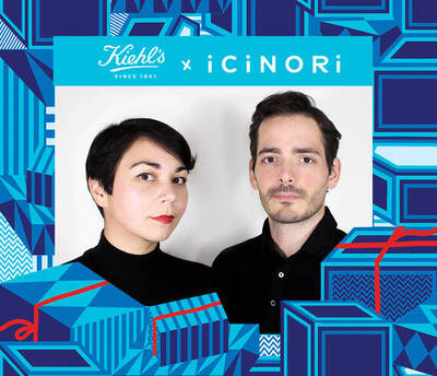 A promotional image featuring two people in black attire against a colorful, patterned background with gift boxes. The image includes branding for Kiehl's and iCiNORI.