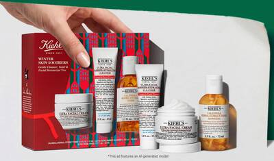 Празничен подаръчен комплект на Kiehl's, съдържащ Ultra Facial Cream, Ultra Facial Barrier-Hydrating Cleanser и Calendula Herbal-Extract Toner, показан с ценови етикет.